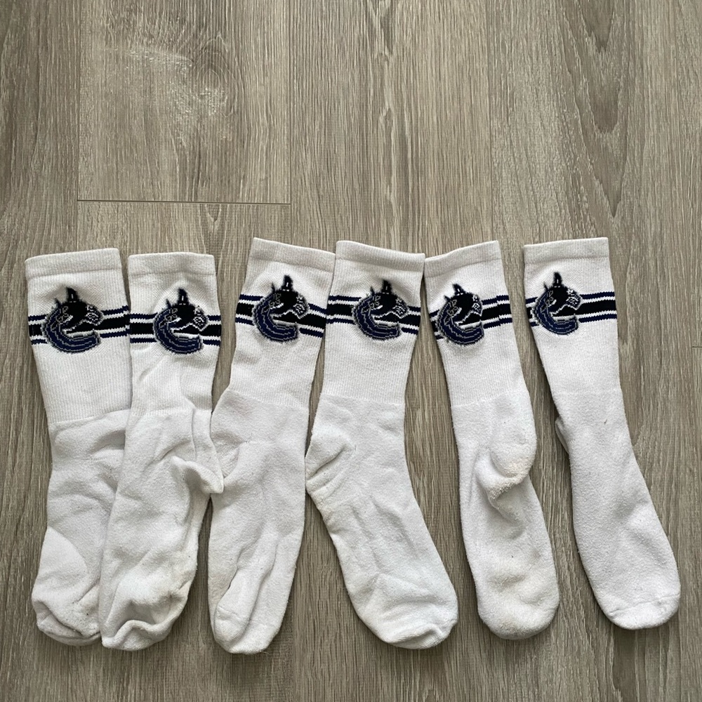 3 pairs of Vancouver Canucks socks